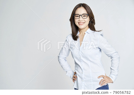 glasses, ophthalmology, young woman, business woman, career woman, nude, gray background 79056782