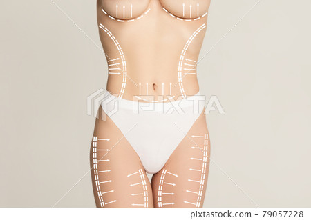 Cropped slim female body in white underwear isolated over white background. Cropped slim female body in white underwear isolated over white background. 79057228