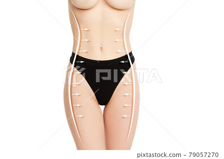 Cropped slim female body in black underwear isolated over white background. Flat belly Cropped slim female body in black underwear isolated over white background. Flat belly 79057270