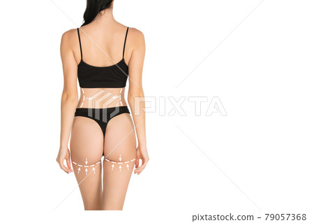Beautiful female body in underwear over white background. Beauty fitness concept. Drawings, arrows on body Beautiful female body in underwear over white background. Beauty fitness concept. Drawings, arrows on body 79057368