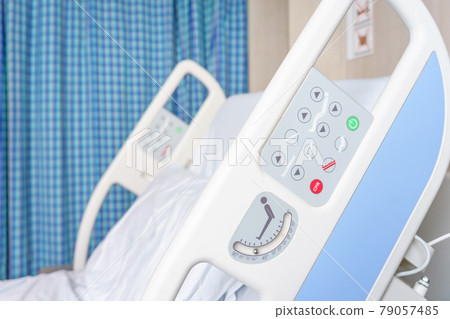Hospital bed remote control hanging on the bed rail. technology of medical and hospital services. image for background, objects, copy space, illustration and article. 79057485