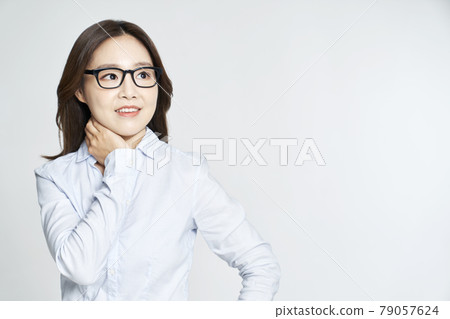 glasses, ophthalmology, young woman, business woman, career woman, nude, gray background 79057624