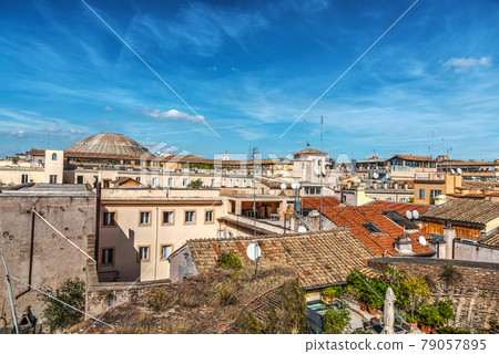 Blue sky over old roofs in Rome Blue sky over old roofs in Rome 79057895