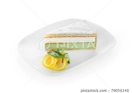 Ricotta cake pistachio on white plate Ricotta cake pistachio on white plate 79058148