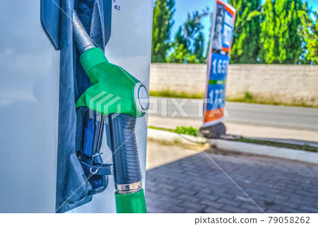 Close up of a fuel nozzle in the countryside 79058262