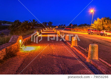 Bike lane by night Bike lane by night 79058266