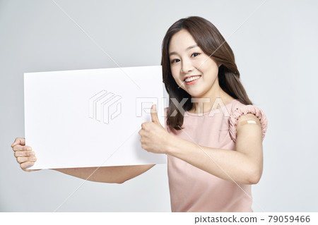 vaccination, vaccination, vaccine, coronavirus, young woman, nukki, gray background vaccination, vaccination, vaccine, coronavirus, young woman, nukki, gray background 79059466