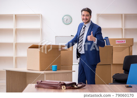 Young male employee in relocation concept 79060170