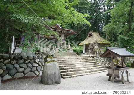 In front of Shirakawa Hachiman Shrine in Shirakawa-go 79060254