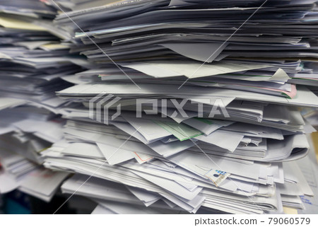 Close up stack of document at office 79060579