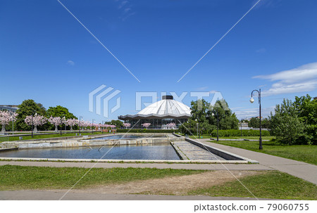 View over the Moscow State Circus on Vernadskogo Prospekt with blooming spring trees, sunny day, Russia View over the Moscow State Circus on Vernadskogo Prospekt with blooming spring trees, sunny day, Russia 79060755