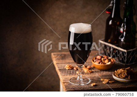 Glass of dark beer Glass of dark beer 79060758