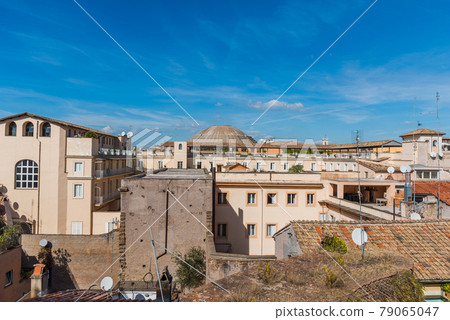 Old roofs under a blue sky in Rome Old roofs under a blue sky in Rome 79065047