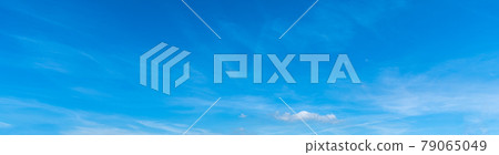 blue sky with small clouds 79065049