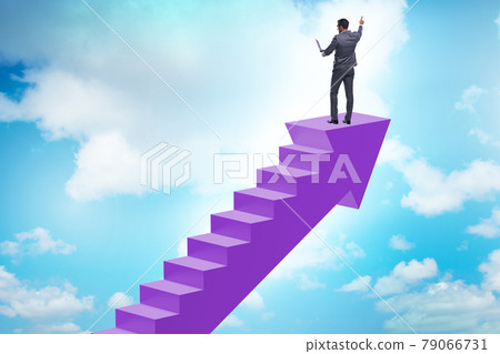 Businessman climbing career ladder in business concept Businessman climbing career ladder in business concept 79066731