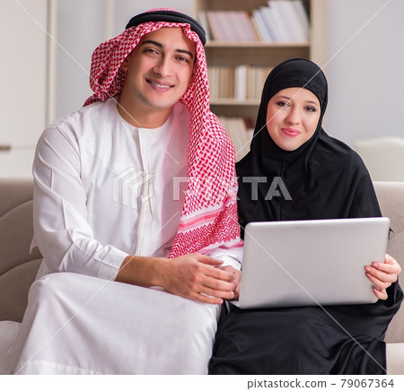 Pair of arab man and woman Pair of arab man and woman 79067364