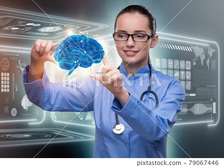 Female doctor with the brain in medical concept 79067446