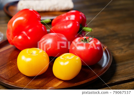 yellow and red tomatoes and bell pepper with water drops. food blogger, stylist 79067537