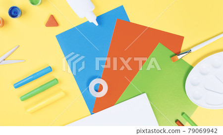 Color paper, paint and school stationery on blue Color paper, paint and school stationery on blue 79069942