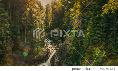 Tatra National Park, Poland. Waterfall Wodogrzmoty Mickiewicza In Summer Mountains Sunset Landscape. Sunlight Through Trees In Tatras. European Nature. UNESCO Tatra National Park, Poland. Waterfall Wodogrzmoty Mickiewicza In Summer Mountains Sunset Landscape. Sunlight Through Trees In Tatras. European Nature. UNESCO 79070181