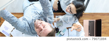 Group of people taking selfie photo on smartphone in office top view 79071894