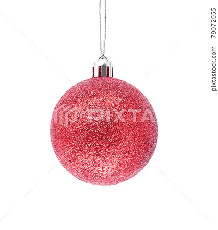 Hanging red glitter Christmas bauble isolated on white background. 79072055
