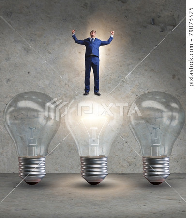 Businessman in new idea concept with light bulb Businessman in new idea concept with light bulb 79073525