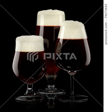 Set of fresh draft beer glasses with bubble froth isolated on black background. 79073685