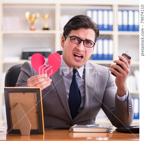 Businessman in saint valentine concept in office 79074110