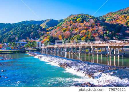 The autumn leaves of Arashiyama and Togetsu bridge 79079621