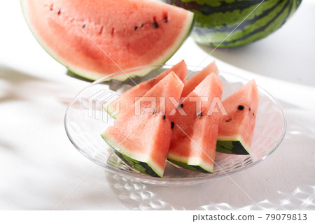 Watermelon served in a glass bowl Watermelon served in a glass bowl 79079813