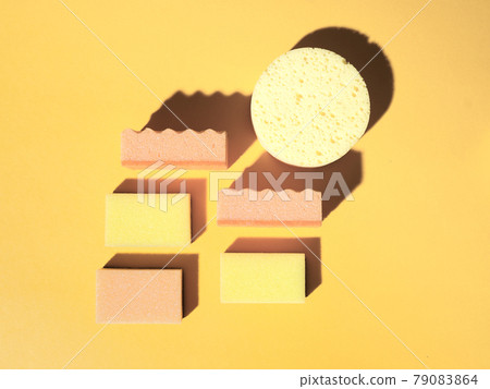 Geometric pattern with domestic sponges on orange Geometric pattern with domestic sponges on orange 79083864