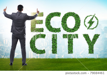 Eco city in ecology concept with businessman Eco city in ecology concept with businessman 79084461