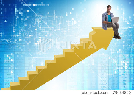 Businessman climbing career ladder in business concept 79084800