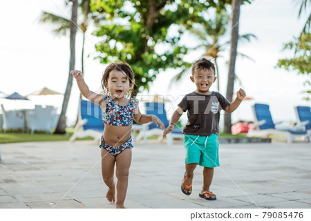 asian fun toddler enjoy playing outside asian fun toddler enjoy playing outside 79085476