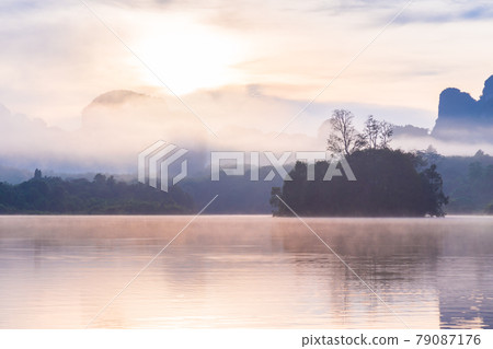 Ban Nong Thale the natural scenery of the sunshine in the morning (mountains, lakes, trees, fog) at Thailand. Ban Nong Thale the natural scenery of the sunshine in the morning (mountains, lakes, trees, fog) at Thailand. 79087176