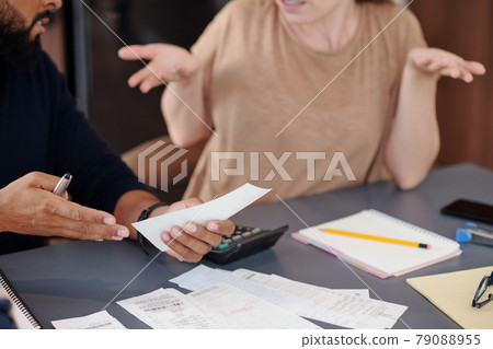 Couple Discussing Big Purchase 79088955