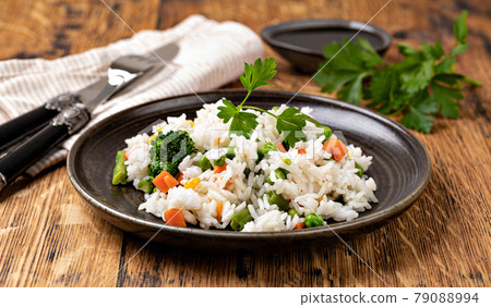 Bowl with tasty rice and vegetables Bowl with tasty rice and vegetables 79088994