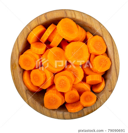 Sliced carrots in a bowl Isolated on white background. Sliced carrots in a bowl Isolated on white background. 79090691