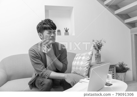 Sick young man in isolation at home Sick young man in isolation at home 79091306