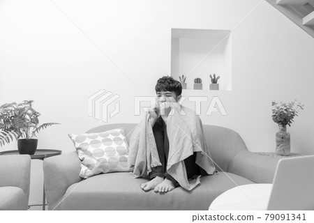 Sick young man in isolation at home Sick young man in isolation at home 79091341