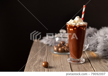 Hot chocolate with marshmallow on wooden table with copy space 79092007