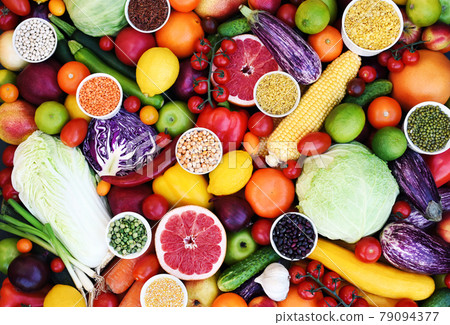 Fresh harvested fruits, greens and vegetables from market, grains and legumes; healthy vegan diet, raw food image 79094377