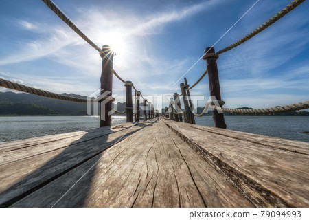 The beautiful scenery of the wooden bridge at Ao Talet (Ta Lhet), Khanom, Nakhon Si Thammarat. 79094993