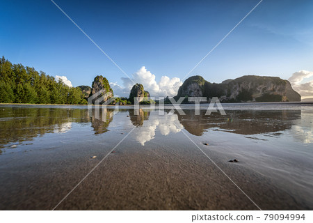 The beautiful scenery of the Rajamangala beach with the reflection at Trang, Thailand. 79094994