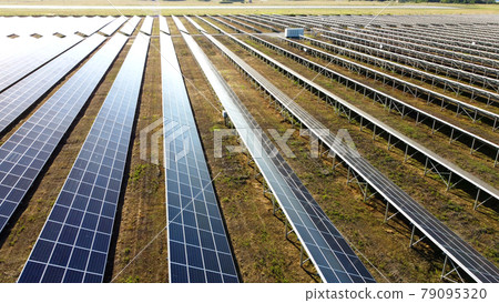 Aerial drone view flight over solar power station panels. Aerial drone view flight over solar power station panels. 79095320