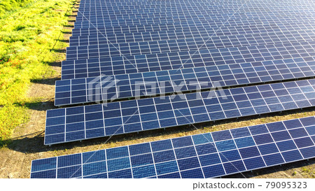 Aerial drone view flight over solar power station panels. Aerial drone view flight over solar power station panels. 79095323