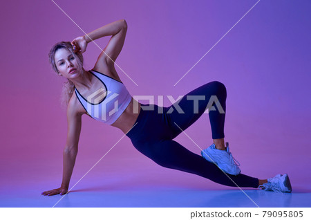 Sexy female athlete, training in studio Sexy female athlete, training in studio 79095805