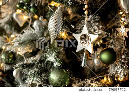 Close up of ornate christmas tree decor holiday background 79097722