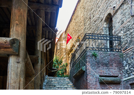 Staircase in the old town of Galata to an animal with a wrought-iron lattice and a Turkish flag Staircase in the old town of Galata to an animal with a wrought-iron lattice and a Turkish flag 79097814